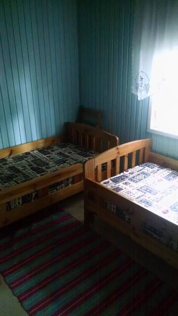 Фото номера Дом с 4 спальнями Загородные дома Treimani Summer House г. Treimani 19